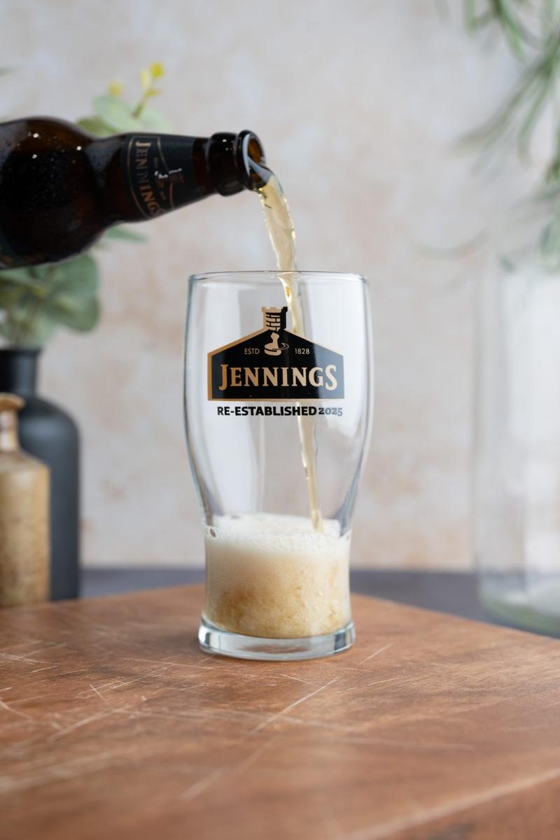 A pint of Jennings poured at the bar