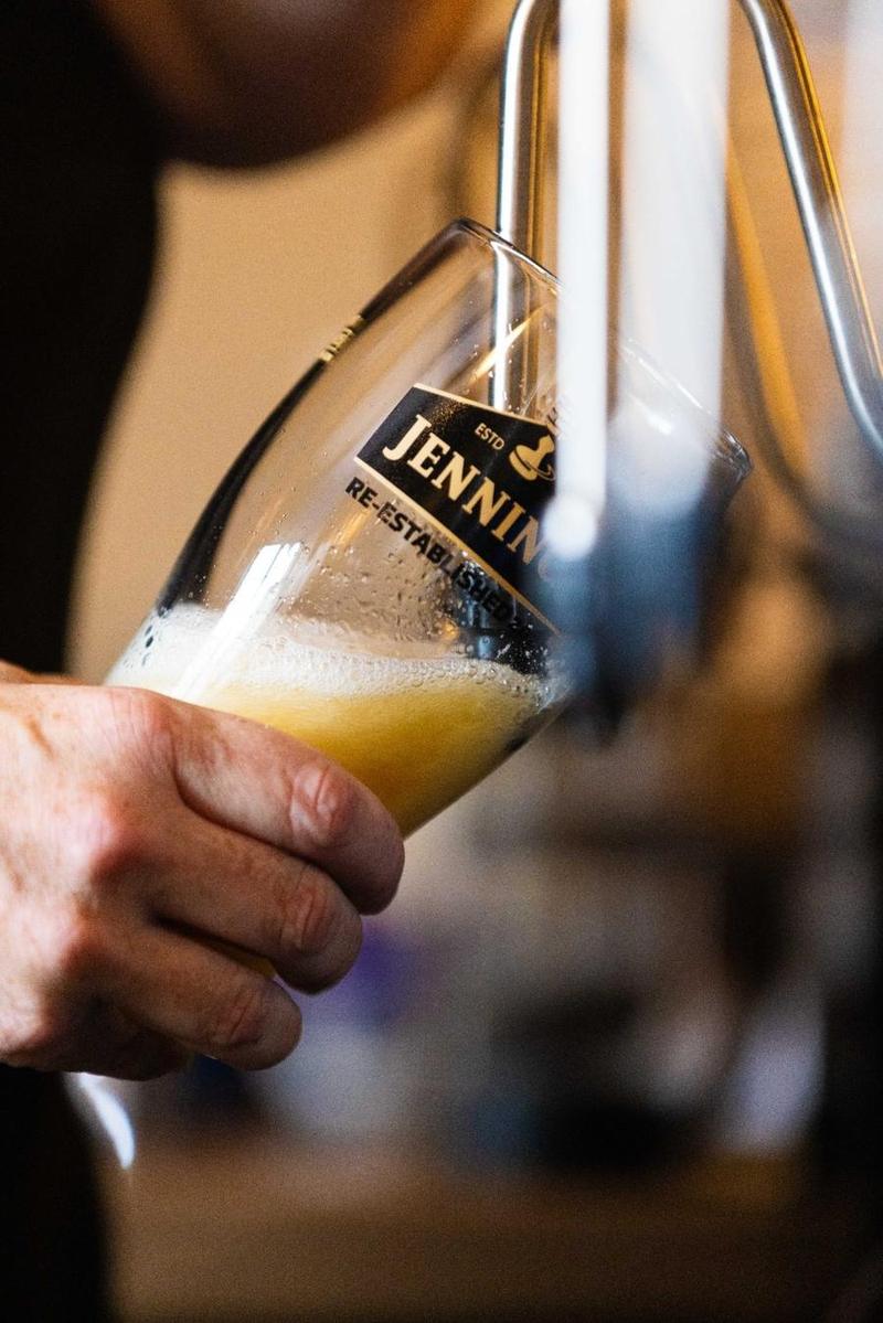 Cask ale poured from the hand pull at the Jennings taproom